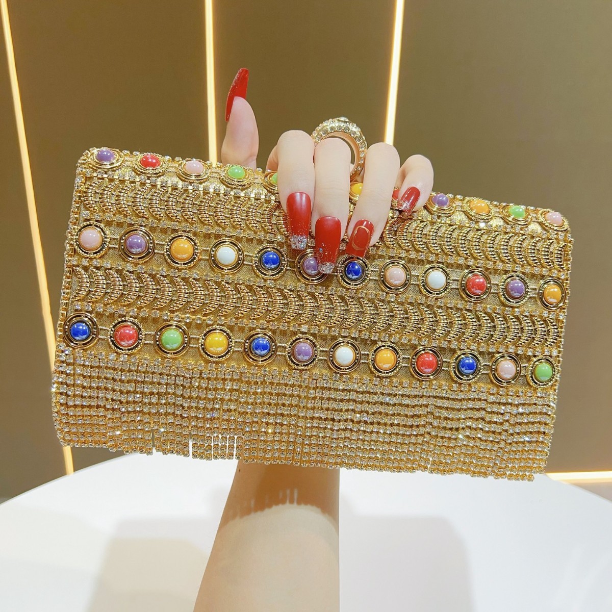 Luxury Bags Europe - Luxuriöse Strass-Quasten-Clutch in Gold und Silber